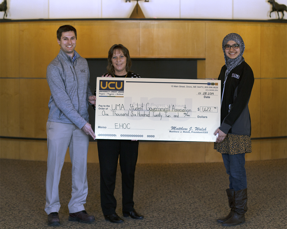 University Credit Union Presents Checks To University Of Maine At